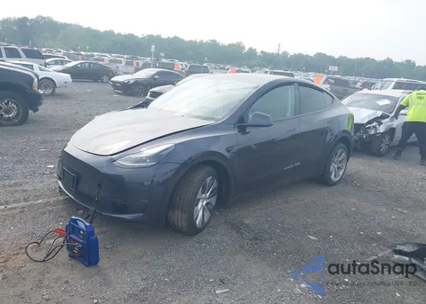 2024 Tesla Model Y from USA, damaged, VIN 7SAYGDEE3RA262510
